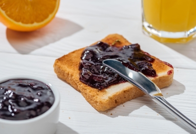 Selective focus of toast with jam near knife and h 2023 11 27 05 11 54 utc min