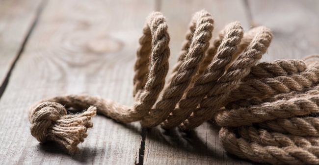 Selective focus of beige knotted nautical rope on 2024 11 18 23 38 22 utc min