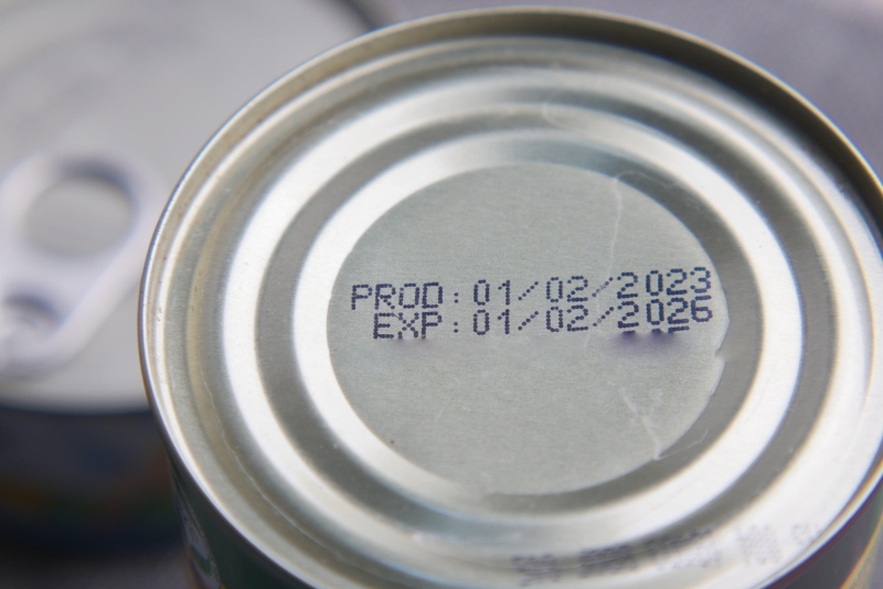 Expire date on food can on white background 2024 12 12 02 52 47 utc min