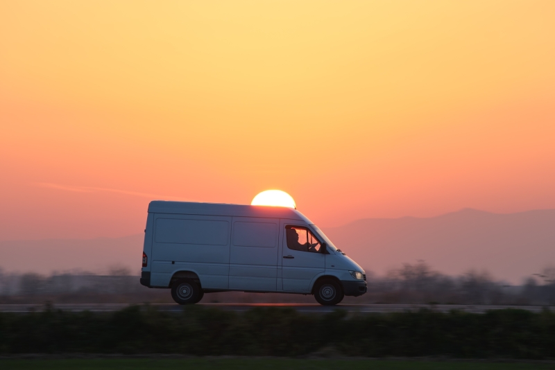 Small cargo van driving on highway hauling goods 2024 12 06 01 14 29 utc