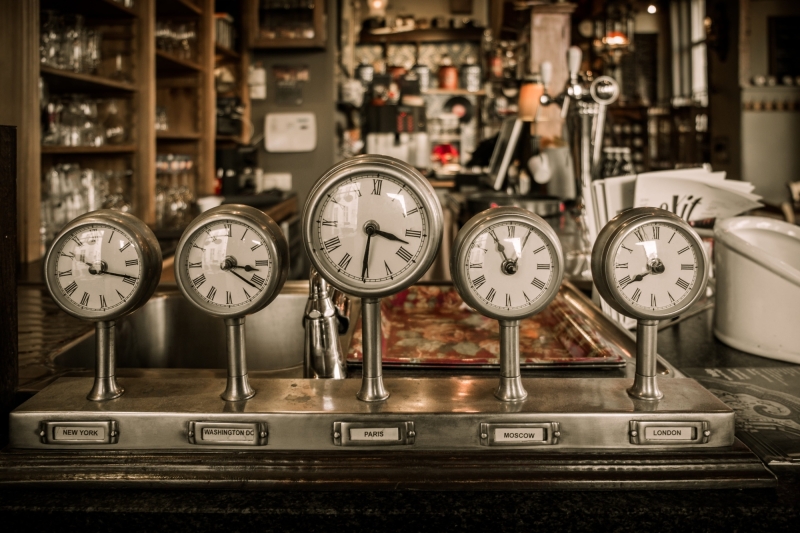 Vintage clocks on a bar counter in a pub 2024 10 18 03 45 31 utc min